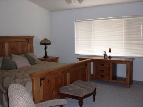 Bedroom photo inside Sunset Greens home located in Mesquite